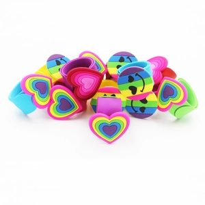 Rainbow silicone slap bracelets for kids featuring colorful heart and smiley face designs