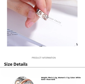 Detail view of couple rings with golden cloud relief and product weight information