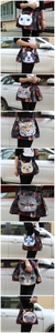 Detail of 3D animal print crossbody bag with sleek silver chain strap shown on model