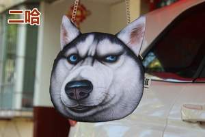 Close-up of a small round chain bag featuring a realistic Husky dog face print design