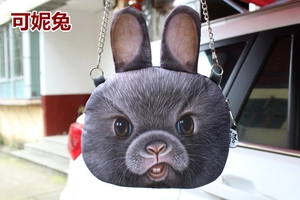 Close-up of Harajuku style rabbit face crossbody bag with 3D ears and silver chain