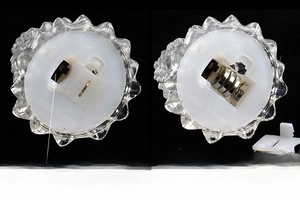 Detail view of the LED crystal Christmas tree base with manual switch and battery compartment