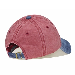 Detail of adjustable metal buckle and vintage washed cotton texture on baseball cap