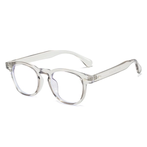 Lunettes rondes transparentes TR90 anti-lumière bleue avec détails de rivets