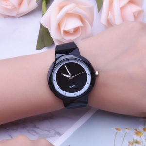 Minimalist black silicone quartz watch for women with round dial on floral background