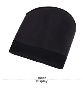 Close-up of thick black fleece lining inside a striped knit winter beanie hat