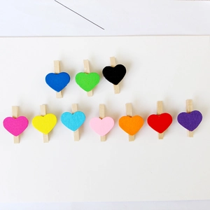 Set of 10 colorful mini wooden heart photo clips for home decor and creative crafts