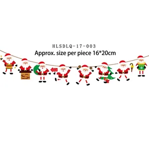 Christmas paper banner with assorted Santa Claus figures and Merry Christmas party lettering