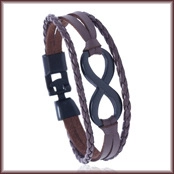 Detailed macro view of multilayered brown braided leather bracelet with black infinity buckle