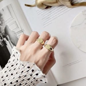 925 sterling silver gold signet ring featuring starburst and eye motifs in a luxury setting