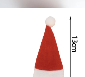 Detailed view of a 13cm mini Christmas hat tableware holder with red and white plush texture