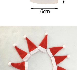 Close-up of mini red and white Christmas hats with a 6cm width dimension for table decor