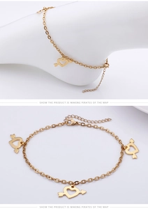 Detail view of gold heart arrow anklet with adjustable extension chain and lobster clasp