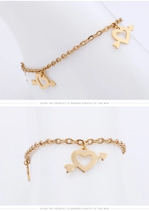 Detail view of heart and arrow gold titanium anklet showing lifestyle and close-up