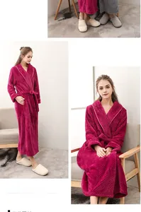 Detail of thick dark rose flannel bathrobe showing textured fabric and fixed waist belt