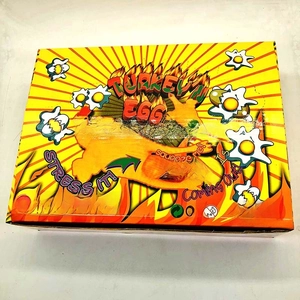 Detail of Turkey Egg toy packaging showing 24pcs box and 6+ years safety warning label
