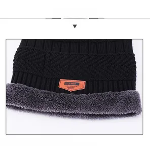 Detail of warm winter knit hat with soft fleece lining and premium leather patch