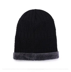 Detailed view of the thick gray fleece lining and knit texture of the winter beanie hat