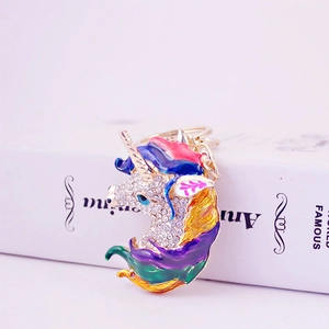 Cute colorful enamel unicorn keychain with sparkling rhinestones and golden metal hardware