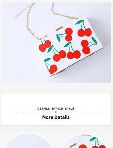 Detail of white acrylic square clutch with cherry print and golden metal clasp