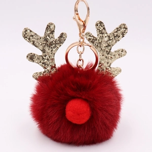 Plush red Christmas elk keychain with glittering gold reindeer antlers and sturdy clasp