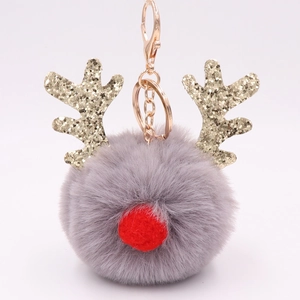 Gray plush reindeer keychain with golden sequin antlers and red nose for bags