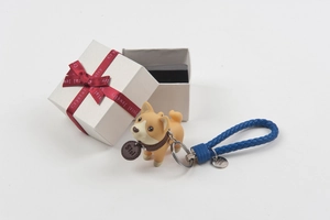Cute Shiba Inu keychain with blue braided strap and elegant white gift box packaging