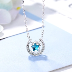 Elegante Halskette mit silbernem Stern und Mond-Anhänger und blauem Kristall für Damen