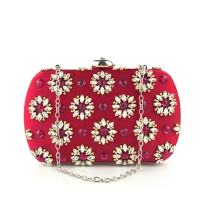 Elegant red silk clutch bag with floral crystal embroidery and silver chain strap
