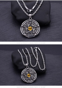 Macro detail of silver titanium steel pentagram pendant with yellow cat eye stone