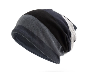 Detailed knit texture and multi-colored striped layers of the autumn winter beanie hat