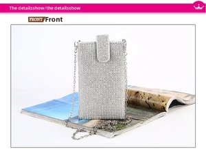 Close-up of sparkling silver rhinestone evening bag with elegant metal chain strap