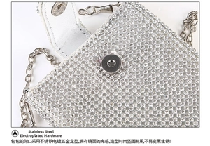 Close-up of silver rhinestone evening bag showing durable magnetic clasp and inner flap