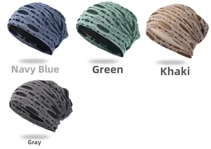 Detailed display of distressed knitted beanies in navy, green, khaki, and grey colors
