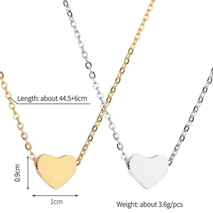 Collar minimalista con colgante de corazón pulido en oro y plata con cadena delgada