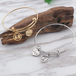 Minimalist titanium steel love heart charm bracelets for couples in gold and silver set