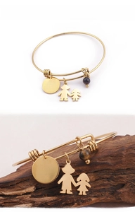 Detail of gold titanium steel bracelet with i love you mom charm and tiger eye bead