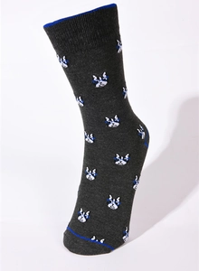 Detail of dark grey crew socks with blue glasses dog pattern and blue heel accents