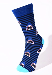Detail view of cotton socks with shark pattern and blue black striped knit texture