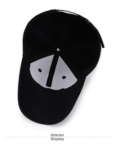 Detailed inner lining of black cotton baseball cap showing white support fabric and stitching