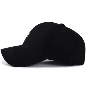 Classic black cotton baseball cap with structured brim and minimalist side embroidery