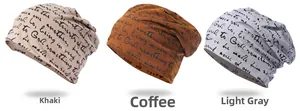 Detailed view of slouchy knit beanies in khaki, brown, and light grey with text prints