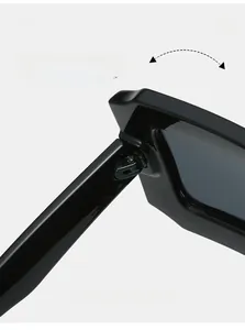 Detail view of durable metal hinges on thick black square frame acetate sunglasses