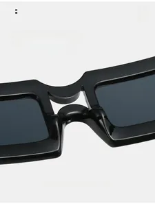 Detail of comfortable integrated nose pads on black square frame fashion sunglasses