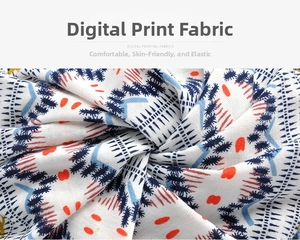 Detail of digital printed knit fabric with blue and orange geometric ethnic patterns