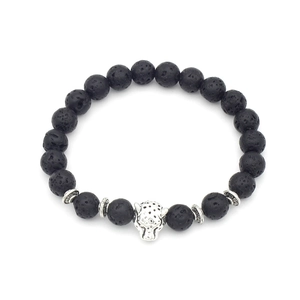 Detailed view of black lava stone beads and silver leopard head charm on elastic bracelet