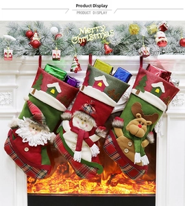 Three 3D Christmas stockings featuring Santa, Snowman, and Reindeer on a fireplace mantle