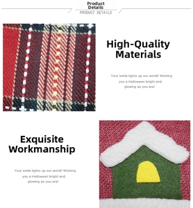 Detail of plaid fabric texture and house applique embroidery on Christmas stocking