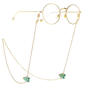 Golden metal glasses chain with blue owl pendants and round frame spectacles
