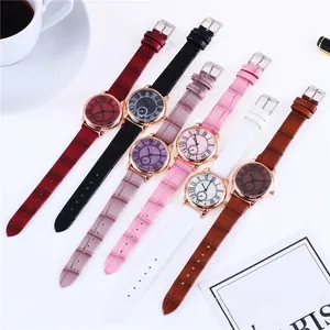 Multiple fashion women's quartz watches with colorful faux leather straps and Roman numerals